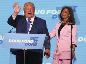 Ontario Premier Doug Ford and wife Karla celebrate onstage after being re-elected in the Ontario provincial election, in Toronto, Thursday, June 2, 2022.