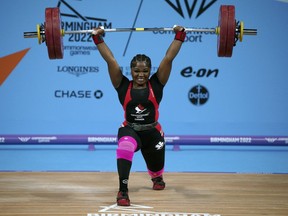 Canada's Maya Laylor lifts to win the gold medal, during the Women's 76kg weightlifting competition at The NEC on day five of the 2022 Commonwealth Games in Birmingham, England, Tuesday, Aug. 2, 2022.