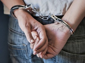 Man in handcuffs.