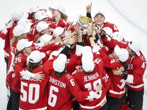 Team Canada celebrates defeating the United States to win gold at the IIHF Women's World Championship in Calgary, Tuesday, Aug. 31, 2021. Canada will host the 2023 women's world hockey championship.