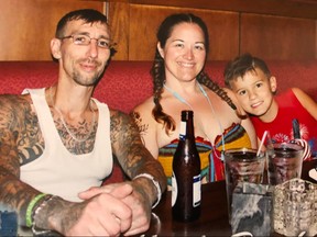 Josh Wilson, left, Staci Wilson, centre, and child. Josh was killed by stranger to whom he offered to give a lift.