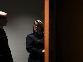 RCMP Commissioner Brenda Lucki and deputy commissioner Brian Brennan wait to appear as a witnesses at the Standing Committee on Public Safety and National Security on Parliament Hill, in Ottawa, July 25, 2022.
