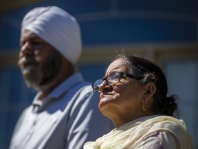 Surjit Singh Mann (left) and Jasmail Kaur Mann, parents of brutal assault victim, realtor and podcaster Joti Singh Mann, in Brampton, Ont. on Thursday, August 11, 2022. The mother chased away the three assailants who attacked her son with two machetes and an axe.