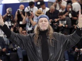 FILE - Actor Leon Vitali poses for photographers at the photo call for the film 'The Shining' at the 72nd international film festival, Cannes, southern France, May 16, 2019. Vitali, the "Barry Lyndon" actor who became one of Stanley Kubrick's closest associates, has died. He was 74. Vitali died Friday in Los Angeles, his family told The Associated Press Sunday, Aug. 21, 2022.