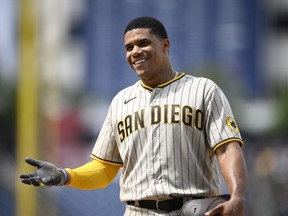 San Diego Padres' Juan Soto reacts at first base during the ninth inning of a baseball game against the Washington Nationals, Sunday, Aug. 14, 2022, in Washington.