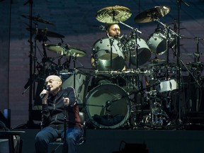 Phil Collins performs with Genesis at London's The O2 arena in March 2022.