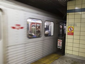 A moving subway car is pictured at the Bloor-Yonge station in this file photo.
