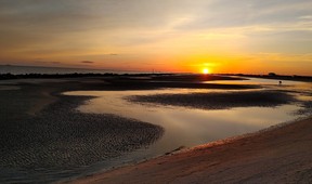 The sun sets on the Gulf of Mexico at Rutherford Beach in Louisiana. (Dave Pollard/Toronto Sun)
