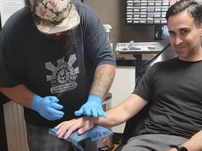 Brandon Dalaly, getting chips implanted in his hand to unlock and lock his Tesla.