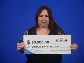 Gabriela Engel of Brampton with her oversized cheque.