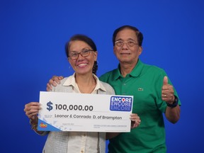 Leonor and Conrado Dominguez are pictured with their Lotto 649 cheque.