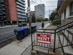 A ‘for rent’ sign outside a home in Toronto on Tuesday July 12, 2022.