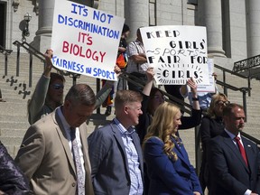 Lawmakers listen as parents speak about the prospect of their children competing against transgender girls in school sports at the Utah State Capitol on March 25, 2022, in Salt Lake City.