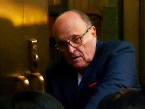 Rudy Giuliani, former U.S. President Donald Trump's personal lawyer, arrives at a courthouse to face a special grand jury regarding a probe into the 2020 election in Atlanta, Georgia, U.S. August 17, 2022 in a still image from video.
