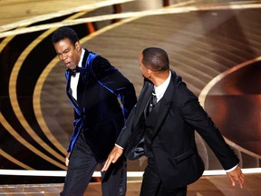 Will Smith slaps Chris Rock at the Oscars earlier this year.