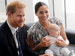 Prince Harry, Duke of Sussex, Meghan, Duchess of Sussex and their baby son Archie Mountbatten-Windsor during their royal tour of South Africa on September 25, 2019 in Cape Town, South Africa.