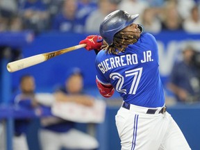 Vladimir Guerrero Jr. of the Toronto Blue Jays hits a double against the Chicago Cubs in the sixth inning at the Rogers Centre on August 31, 2022 in Toronto, Ontario, Canada.
