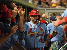 Paul Goldschmidt #46 of the St. Louis Cardinals celebrates with teammates in the dugout after scoring a three run RBI double by Nolan Arenado #28 (not pictured) in the ninth inning during the game against the Pittsburgh Pirates at PNC Park on September 10, 2022 in Pittsburgh, Pennsylvania.