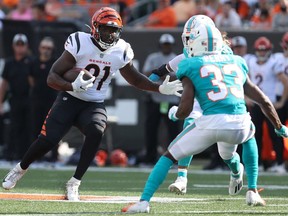 Jacques Patrick #31 of the Cincinnati Bengals runs with the ball against the Miami Dolphins at Paul Brown Stadium on August 29, 2021 in Cincinnati, Ohio.