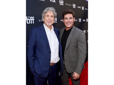 Peter Farrelly and Zac Efron attend "The Greatest Beer Run Ever" premiere during the 2022 Toronto International Film Festival at Roy Thomson Hall on Sept. 13, 2022 in Toronto.