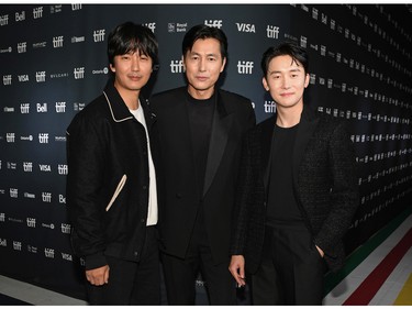 Left to right: Jun-han Kim, Jung Woo-sung,, and Nam-gil Kim attend the "A Man Of Reason" Premiere during the 2022 Toronto International Film Festival at Royal Alexandra Theatre on Sept. 13, 2022 in Toronto.