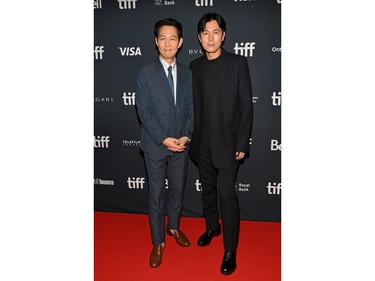 Lee Jung-jae, left, and Jung Woo-sung attend the "Hunt" Premiere during the 2022 Toronto International Film Festival at Roy Thomson Hall on Sept. 15, 2022 in Toronto.