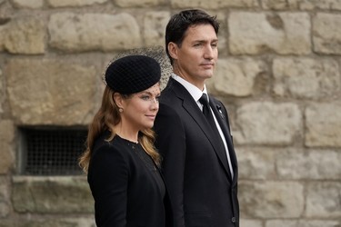Sophie Gregoire Trudeau and Prime Minister of Canada Justin Trudeau depart Westminster Abbey after the funeral service of Queen Elizabeth II on September 19, 2022 in London.
