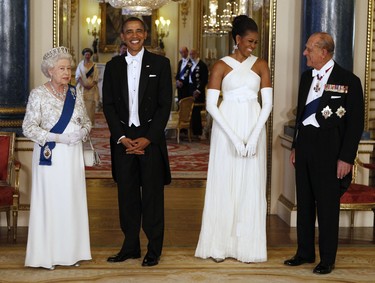 Britain's Queen Elizabeth II (L) and US President Barack Obama (2ndL) pose with US First Lady Michelle Obama (2ndR) and Prince Philip (R), Duke of Edinburgh, in the Music Room of Buckingham Palace ahead of a State Banquet on May 24, 2011 in London, England. (POOL/AFP via Getty Images)