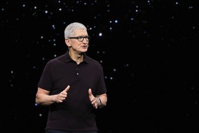Apple CEO Tim Cook presents the new iPhone 14 at an Apple event at their headquarters in Cupertino, Calif., Sept. 7, 2022.
