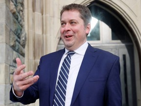 Conservative MP Andrew Scheer speaks to media on Parliament Hill in Ottawa, Feb. 9, 2022.