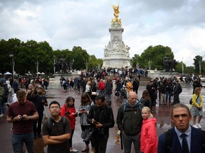 Crowds gather outside Buckingham Palace in central London as worries grew for the health of Queen Elizabeth II, Thursday, Sept. 8, 2022.