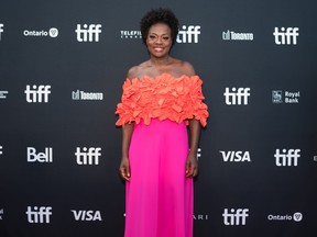 Viola Davis poses for a photograph on the red carpet for the film, The Woman King, at Roy Thomson Hall during night two of the Toronto International Film Festival on, Friday, September 9, 2022.