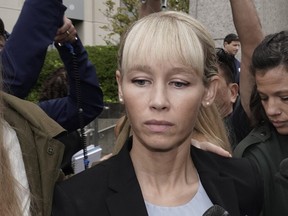 Sherri Papini leaves the courthouse after Federal Judge William Shubb sentenced her to 18 months in federal prison, in Sacramento, Calif., Monday, Sept. 19, 2022.