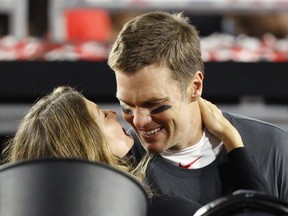 NFL Football - Super Bowl LV - Tampa Bay Buccaneers v Kansas City Chiefs - Raymond James Stadium, Tampa, Florida, U.S. - February 7, 2021 Tampa Bay Buccaneers' Tom Brady and his wife Gisele Bundchen celebrate after winning the Super Bowl LV.