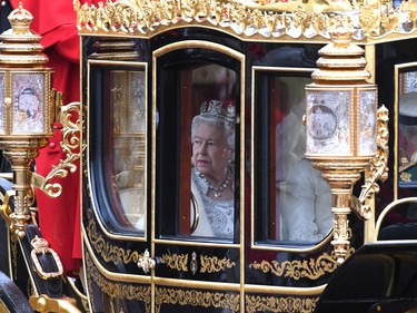 LONDON, ENGLAND - OCTOBER 14: Queen Elizabeth II, Prince Charles, Prince of Wales and Camilla, Duchess of Cornwall head back to Buckingham Palace in a carriage along The Mall after the State Opening of Parliament at the Palace of Westminster on October 14, 2019 in London, England. The Queen's speech is expected to announce plans to end the free movement of EU citizens to the UK after Brexit, new laws on crime, health and the environment. (Photo by Chris J Ratcliffe/Getty Images)