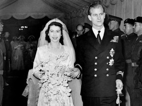 Princess Elizabeth of England and Prince Philip are seen on their wedding day 20th November 1947, in London. (CENTRAL PRESS/AFP via Getty Images)