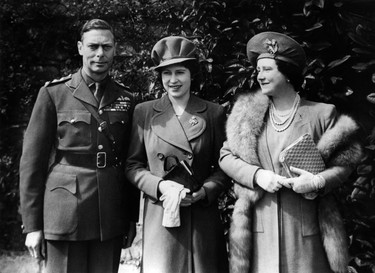 Queen Mother Elizabeth Bowes-Lyon (R) and King George VI, pose with their daughter Princess Elizabeth on April 21, 1944, as they celebrate her 18th birthday at Windsor Castle. (PLANET NEWS/AFP via Getty Images)