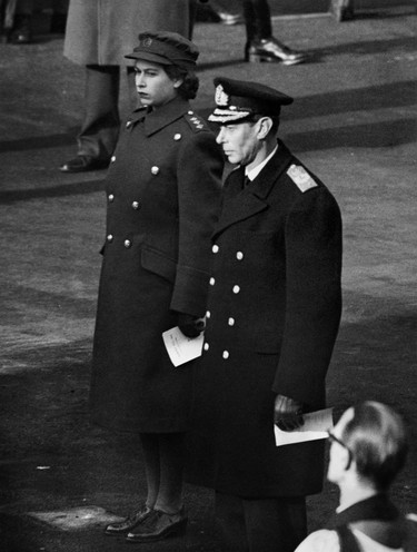 Princess Elizabeth of York and King George VI in ATS uniform stand at the Cenotaph during the first time armistice ceremony since 1938, on November 11, 1945, in London. (PLANET NEWS/AFP via Getty Images)