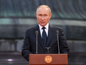 Russian President Vladimir Putin gives a speech.