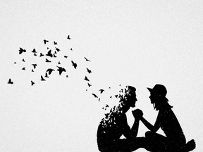 Silhouette of lovers and flying birds