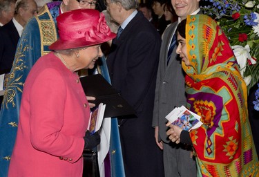 Queen Elizabeth II meets Malala Yousafzai as they attend the Commonwealth day observance service at Westminster Abbey on March 10, 2014 in London, England.  (Arthur Edwards - WPA Pool/Getty Images)