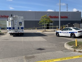Peel Regional Police at the scene of a fatal stabbing at a Canadian Tire store in Mississauga, Sept. 20, 2022.