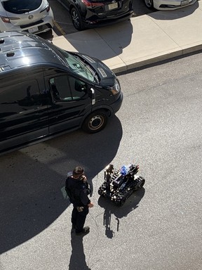 Peel cops deploy a robotic device in the area of Credit Valley Hospital on Friday, Sept. 30 for a person barricaded inside a medical facility. JOE WARMINGTON/TORONTO SUN