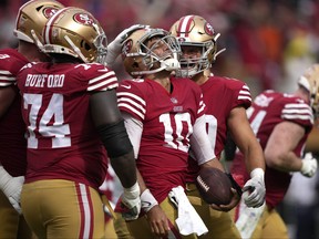 Jimmy Garoppolo reacts after scoring a touchdown against the Seattle Seahawks in Week 2. Garoppolo will lead the 49ers offense now that Trey Lance is out for the season.