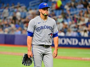 Blue Jays starting pitcher Jose Berrios walks off the field following the second inning against the Rays at Tropicana Field in St Petersburg, Fla., Thursday, Sept. 22, 2022.