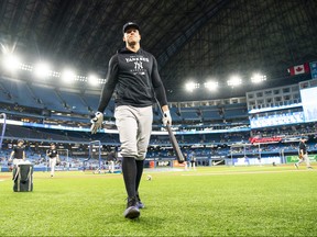 Aaron Judge #99 of the New York Yankees walks off the field after batting practice before playing the Toronto Blue Jays on Monday night.