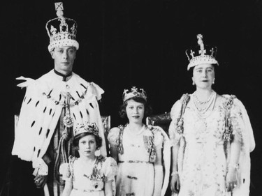 FILE -- Queen Elizabeth, the Queen Mother, poses with her husband  King George VI,  and their two daughters, Princess Elizabeth, centre, and Princess Margaret, following the King's coronation, in this 1937 file photo. The King died 50 years ago on Feb. 6, 1952. (CP PICTURE ARCHIVE/AP) * Calgary Herald Merlin Archive *