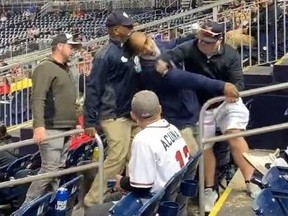 In a viral video, a Washington Nationals fan sucker punches an usher as he was being escorted out.