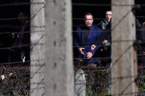 Actor and former California Governor Arnold Schwarzenegger visits former Nazi German concentration camp Auschwitz-Birkenau, near Oswiecim, Poland, Sept. 28, 2022.