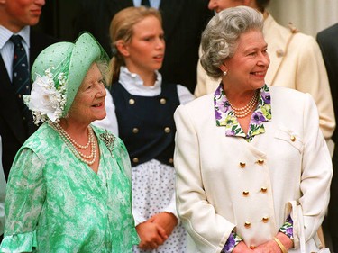 The Queen Mother (L) is joined by her eldest daughter, Queen Elizabeth II outside Clarence House 04 August 1993 on her 93rd birthday. The Queen Mother is the widow of Britain's wartime monarch, King George VI. (Photo credit should read EPA/AFP via Getty Images)